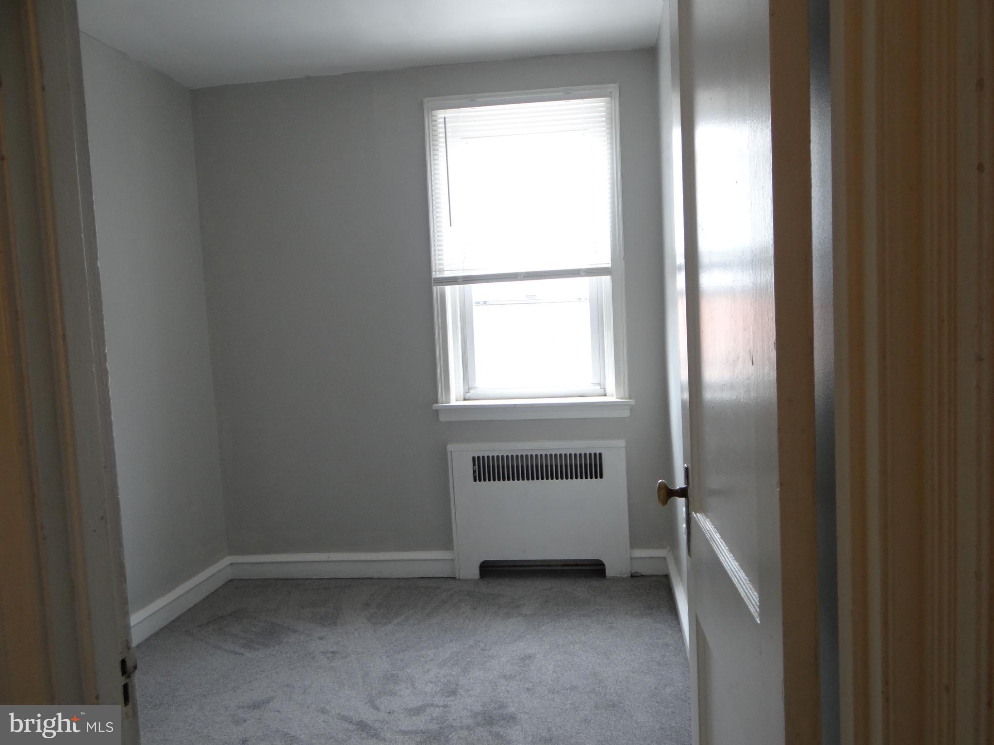 6744 Rutland Street Philadelphia, PA 19149 - Photo 31 of 44 a view of an empty room with a window