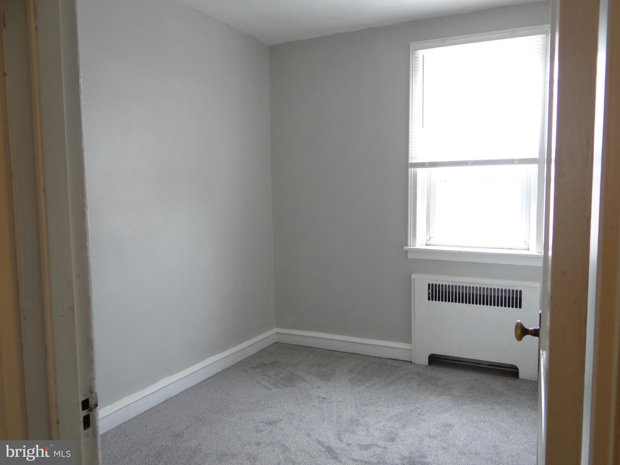 6744 Rutland Street Philadelphia, PA 19149 - Photo 32 of 44 a view of an empty room with a window