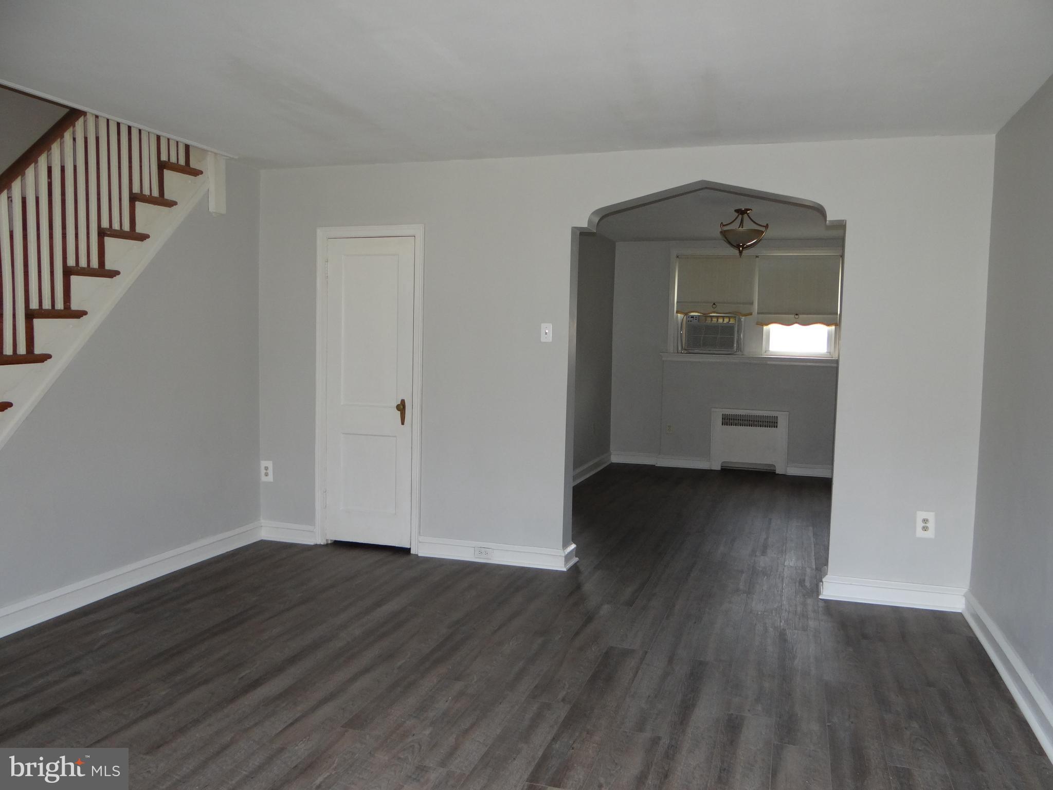 6744 Rutland Street Philadelphia, PA 19149 - Photo 4 of 44 wooden floor in an empty room with a window