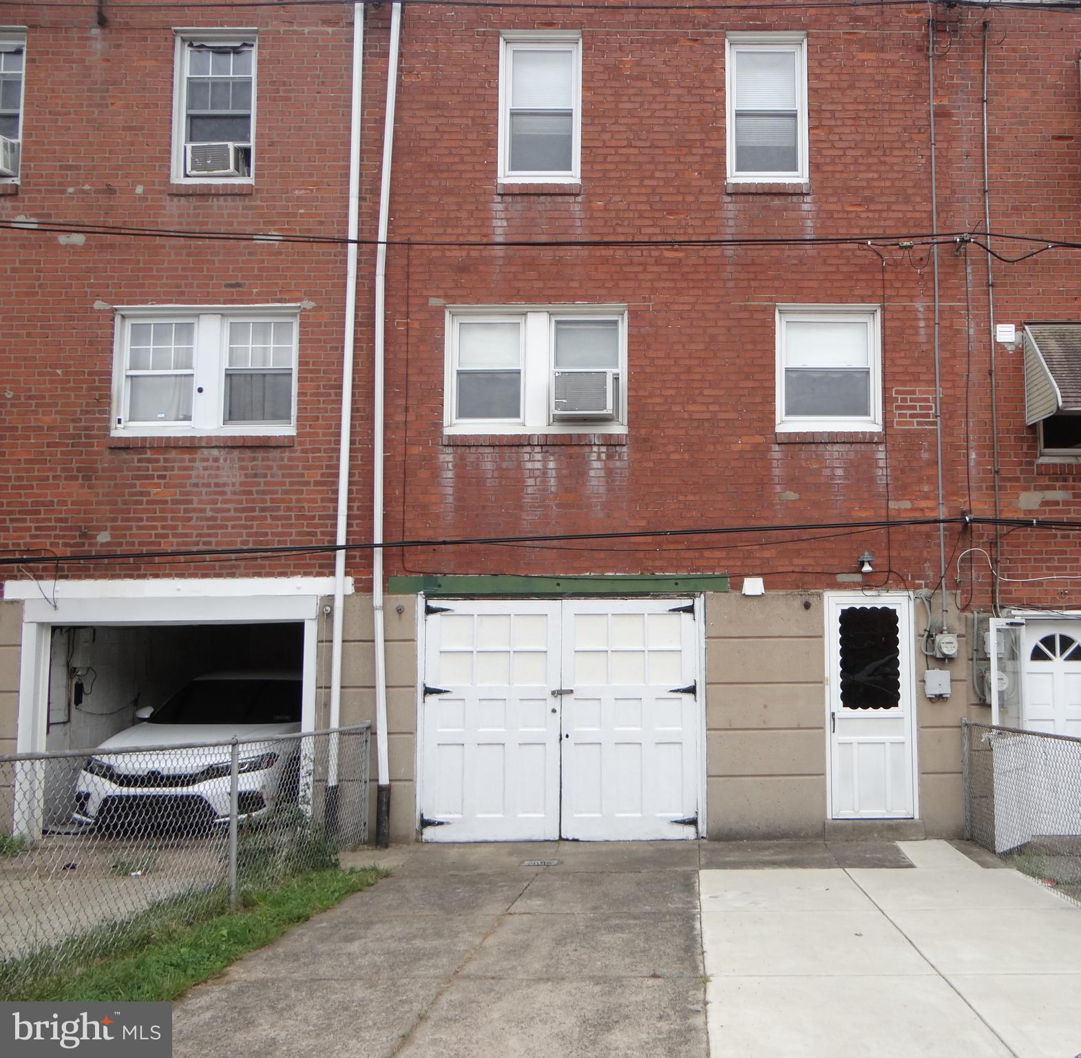 6744 Rutland Street Philadelphia, PA 19149 - Photo 42 of 44 a view of a brick building with many windows