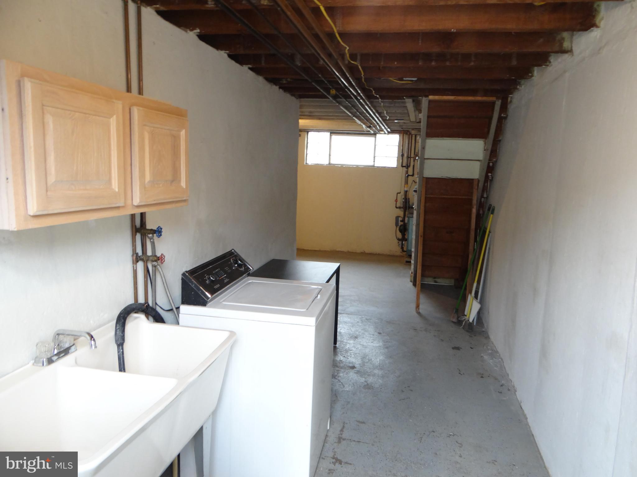 6744 Rutland Street Philadelphia, PA 19149 - Photo 43 of 44 a utility room with dryer and washer