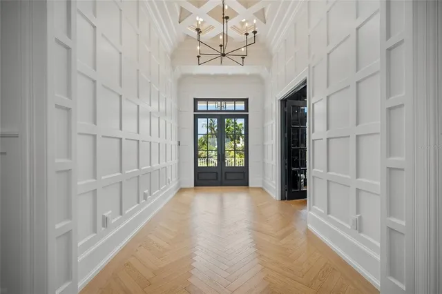 a kitchen with stainless steel appliances granite countertop a refrigerator and a stove