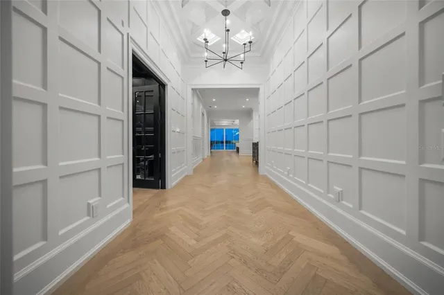 a kitchen with stainless steel appliances granite countertop a refrigerator and a stove