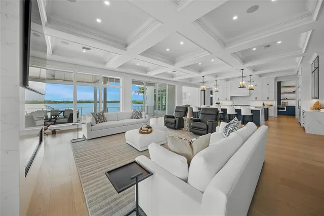 a bed room with a bed and a large window