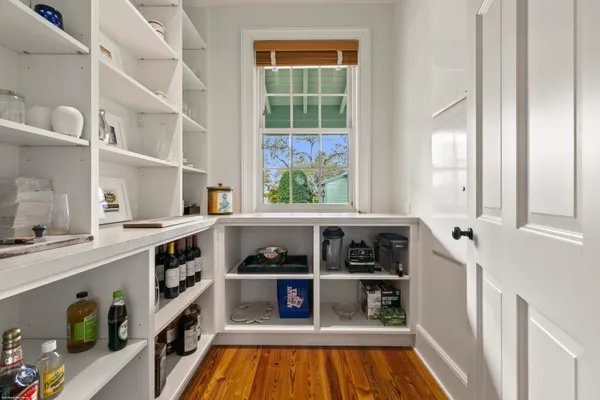 a view of cabinets and window