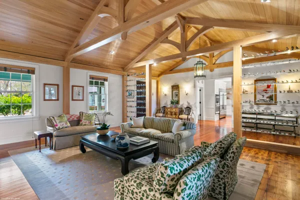 a living room with furniture and a table