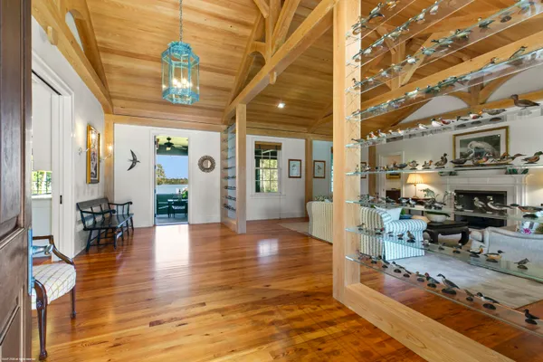 a view of a living room and kitchen