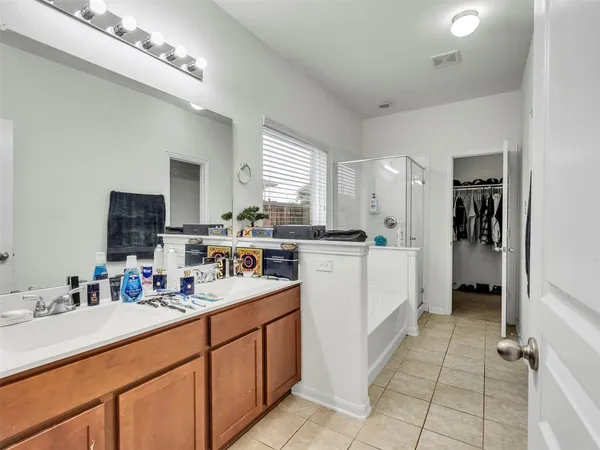 a kitchen with a sink cabinets and window