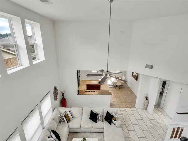 a living room with furniture and a table