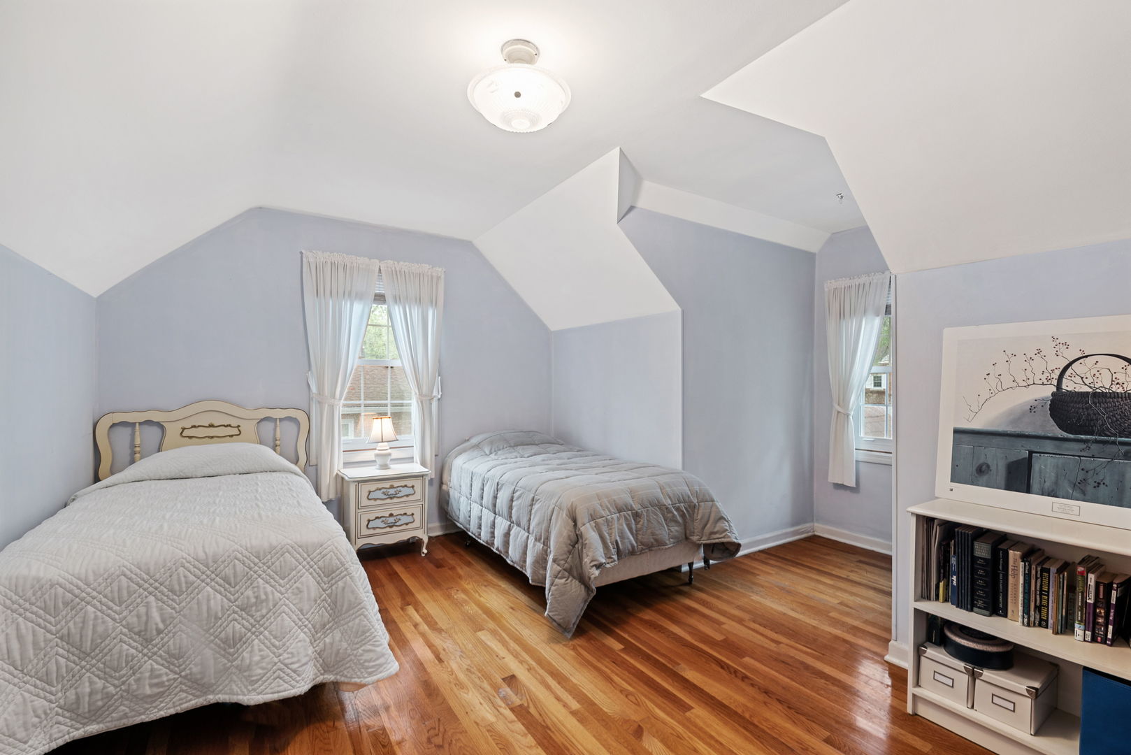 1656 Pine Road Homewood, IL 60430 - Photo 14 of 23 a bedroom with a bed and a book shelf