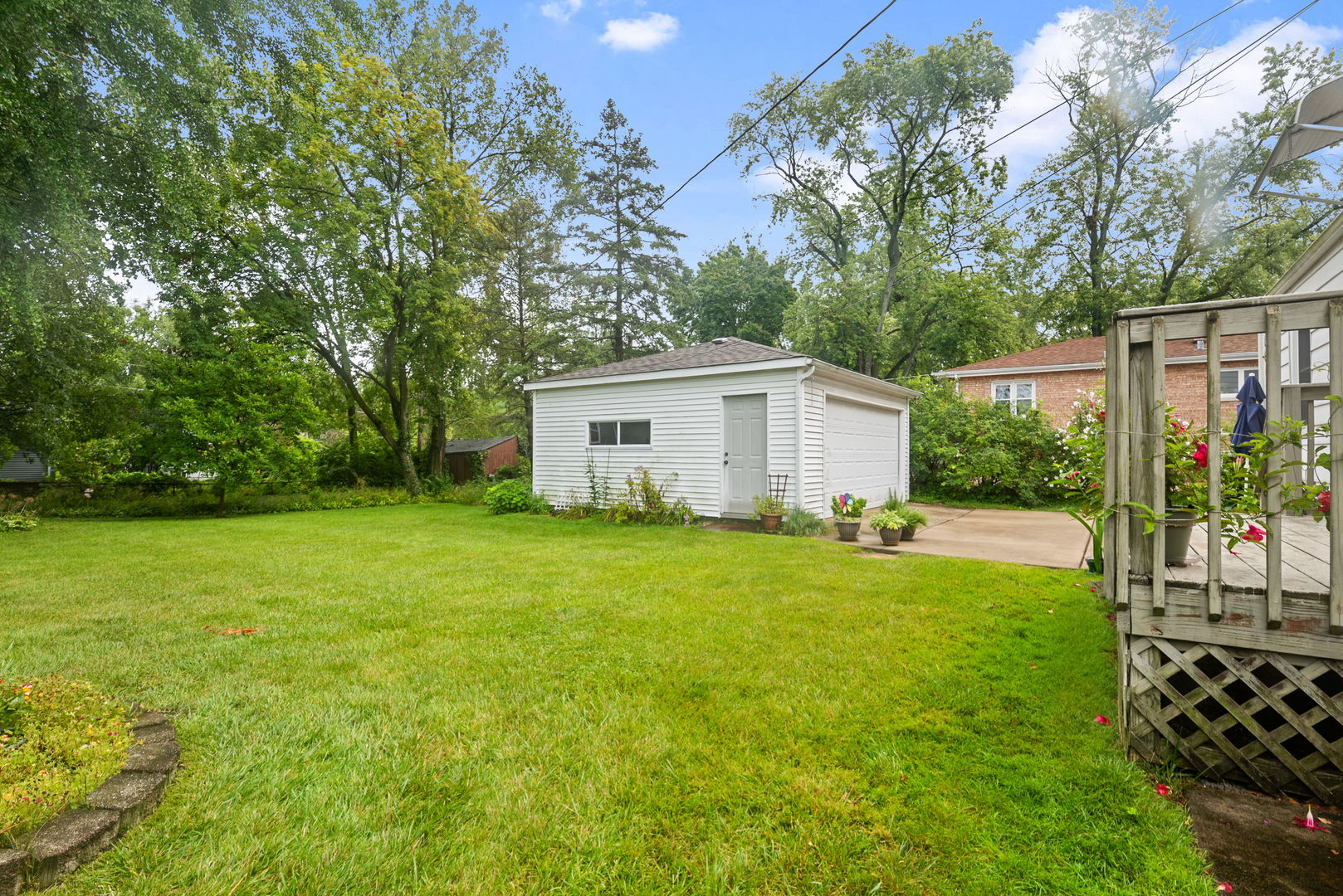 1656 Pine Road Homewood, IL 60430 - Photo 18 of 23 a view of a house with backyard and garden
