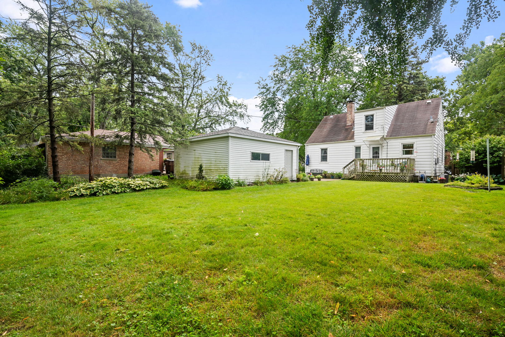 1656 Pine Road Homewood, IL 60430 - Photo 19 of 23 a front view of a house with garden