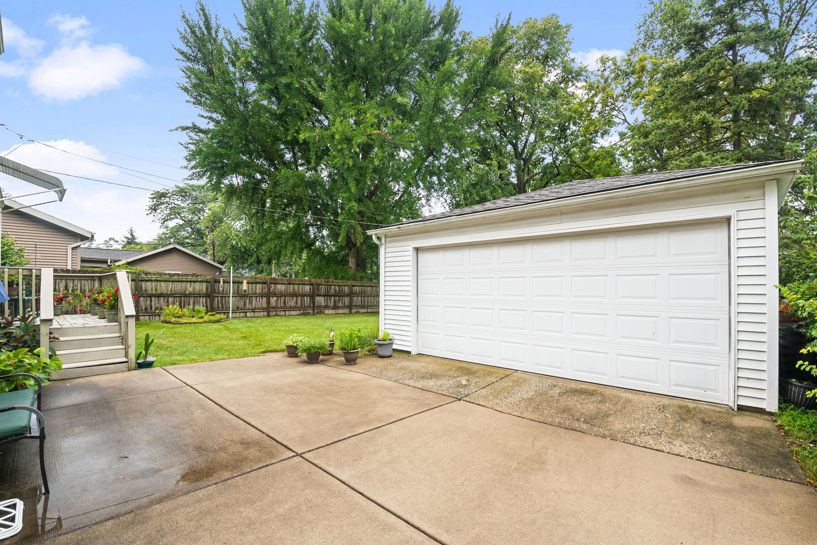 1656 Pine Road Homewood, IL 60430 - Photo 3 of 23 a view of a house with a yard and large tree