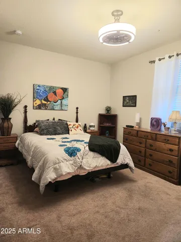 a view of a workspace with wooden floor