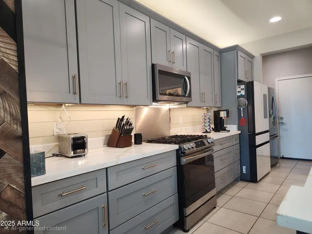a stove top oven sitting inside of a kitchen