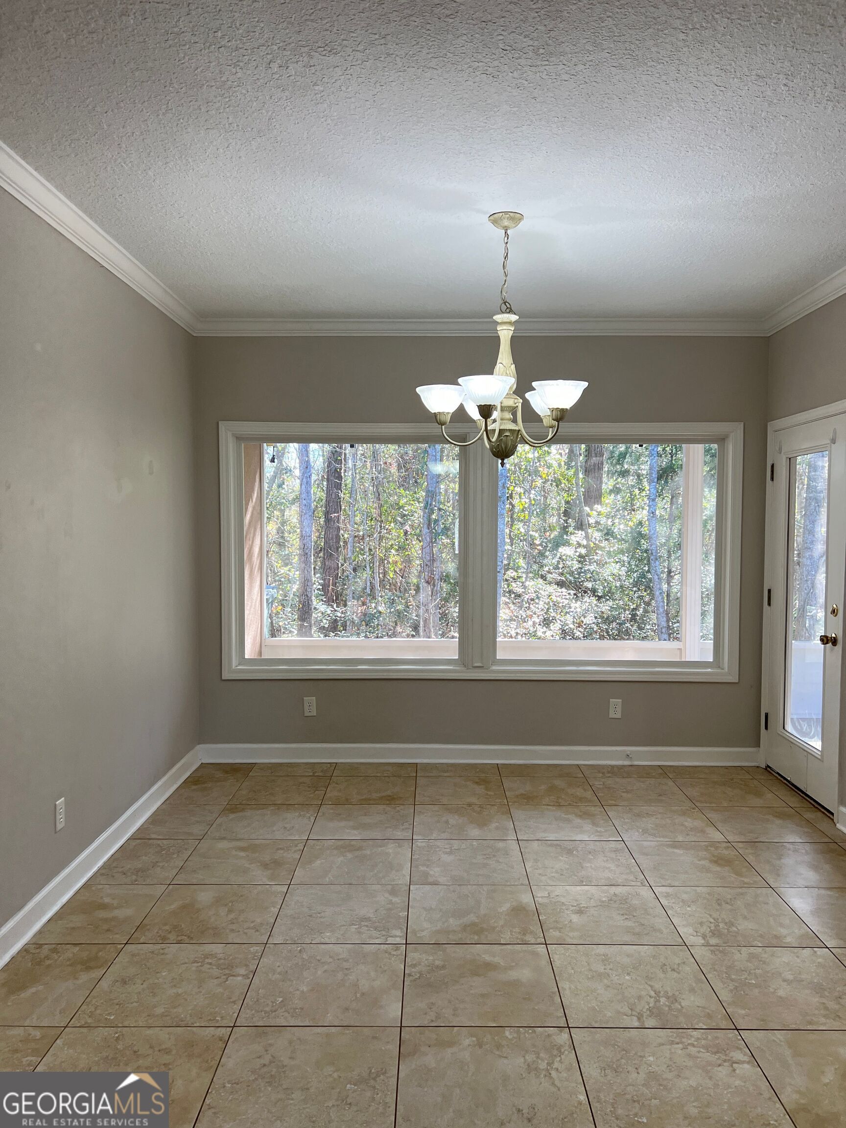 120 Renee Drive Kingsland, GA 31548 - Photo 15 of 23 a view of an empty room with a window