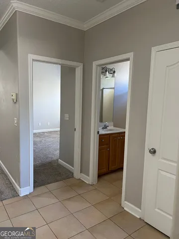 a bathroom with a tub and a shower