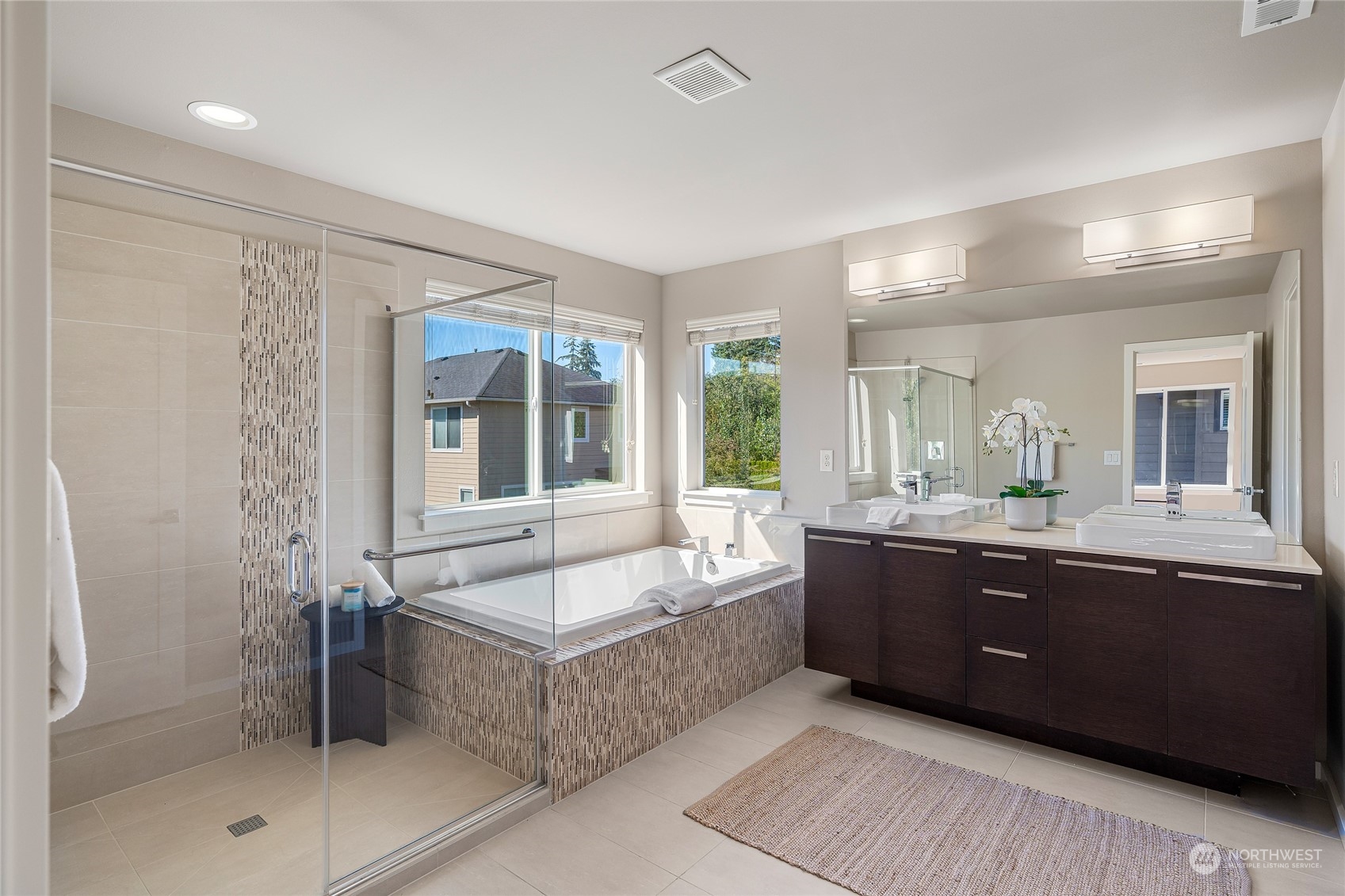 3926 171st Place Southeast Bothell, WA 98012 - Photo 15 of 40 a spacious bathroom with a tub sink and mirror