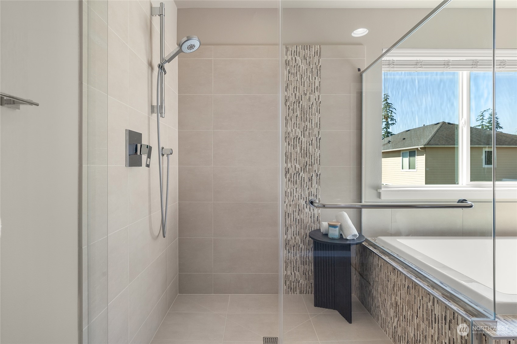 3926 171st Place Southeast Bothell, WA 98012 - Photo 16 of 40 a bathroom with a bathtub and shower