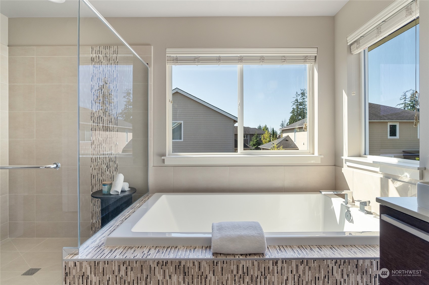 3926 171st Place Southeast Bothell, WA 98012 - Photo 17 of 40 a bathroom with a bathtub and window