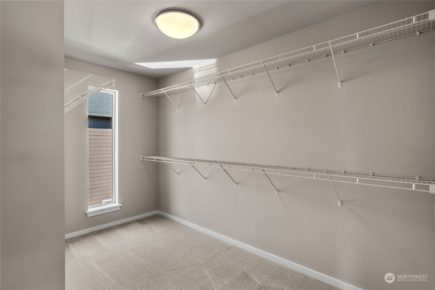 3926 171st Place Southeast Bothell, WA 98012 - Photo 18 of 40 a view of a room with racks on the wall