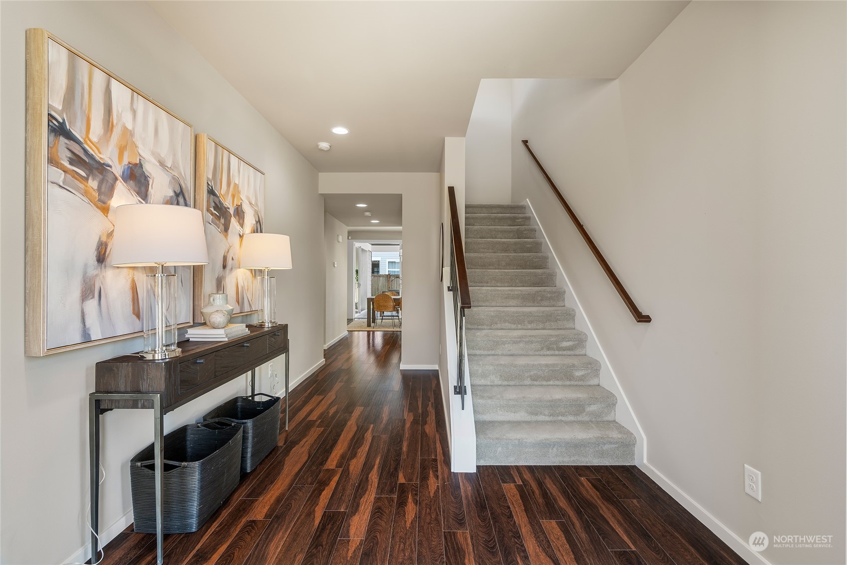 3926 171st Place Southeast Bothell, WA 98012 - Photo 25 of 40 a view of a hallway with wooden floor and staircase