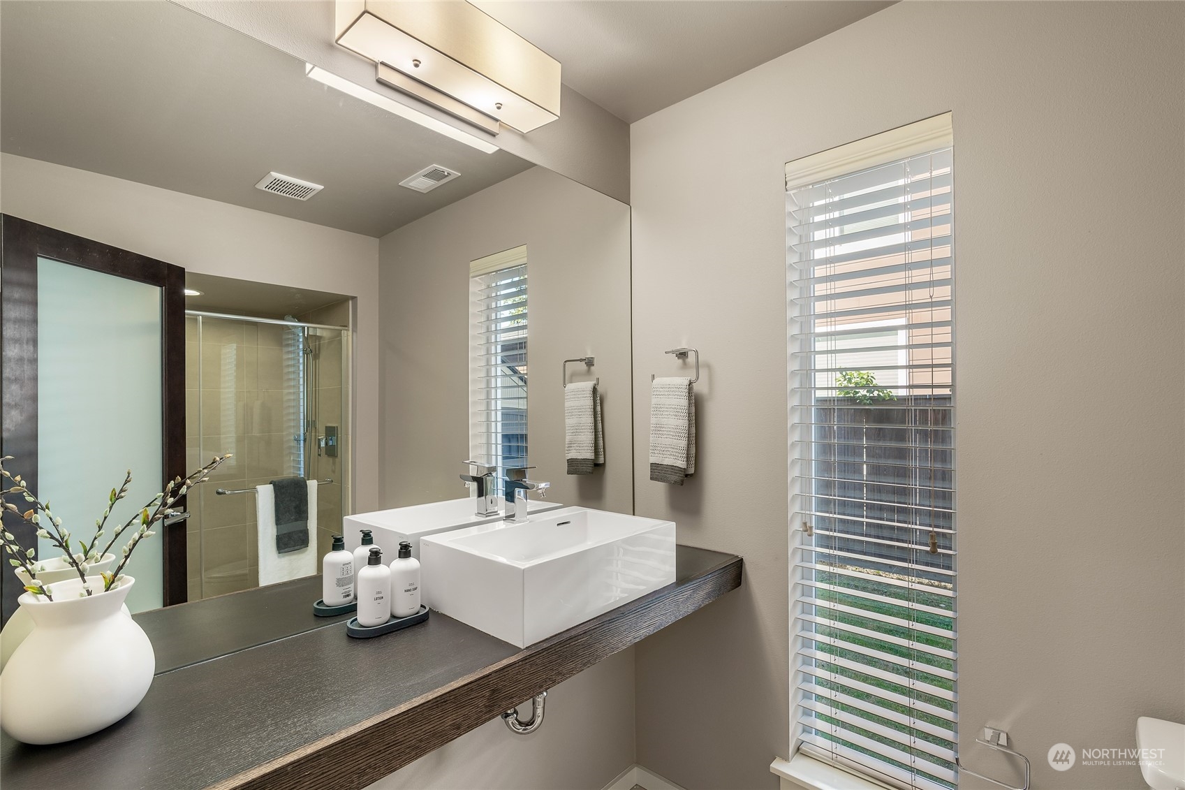 3926 171st Place Southeast Bothell, WA 98012 - Photo 27 of 40 a bathroom with a sink and a mirror