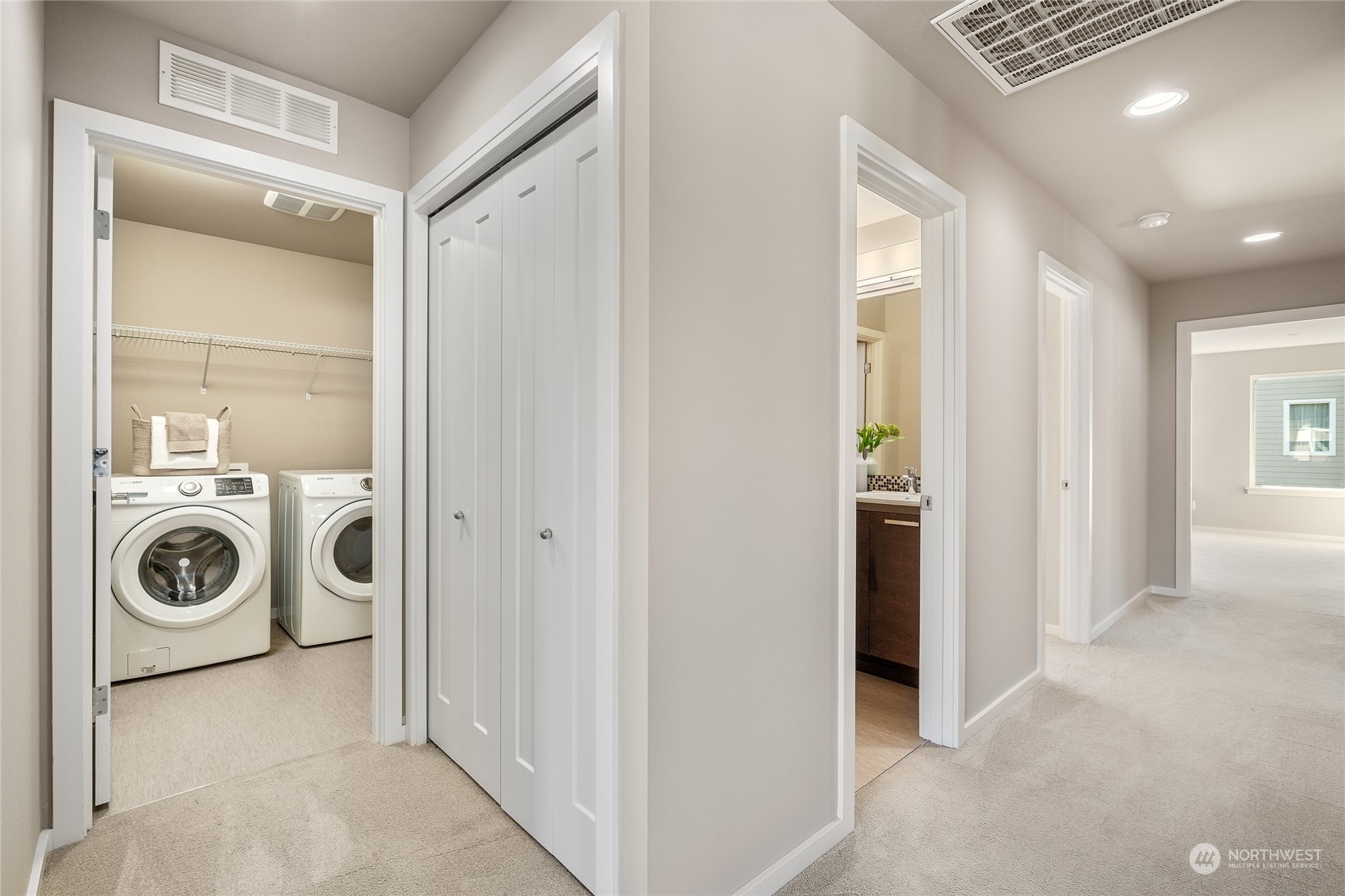 3926 171st Place Southeast Bothell, WA 98012 - Photo 29 of 40 a view of a hallway with washer and dryer