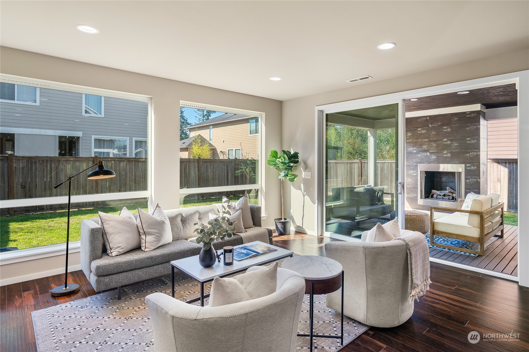 3926 171st Place Southeast Bothell, WA 98012 - Photo 5 of 40 a living room with furniture and a large window