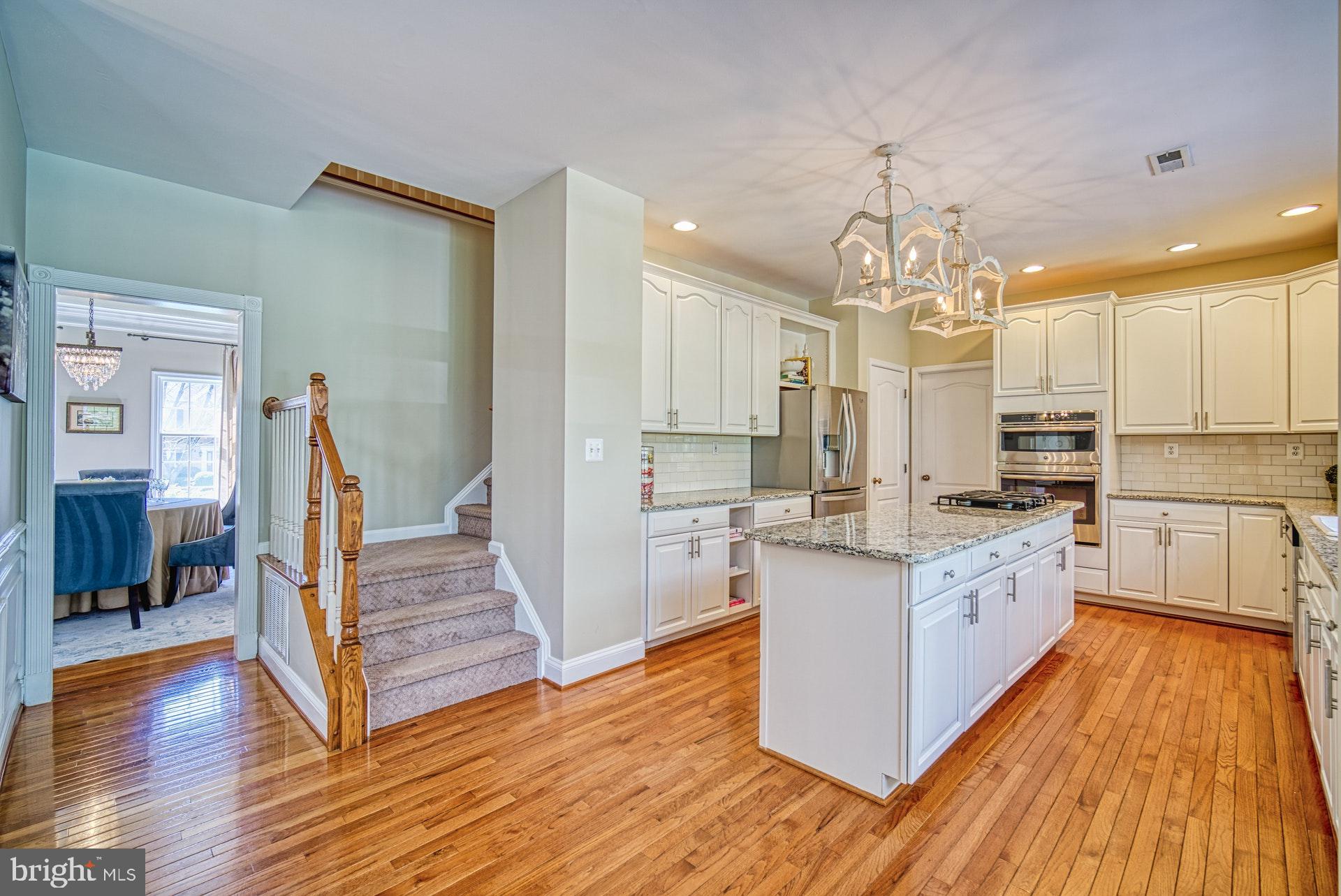 10896 Hunter Gate Way Reston, VA 20194 - Photo 13 of 70 KITCHEN HAS 2ND STAIRWAY UP