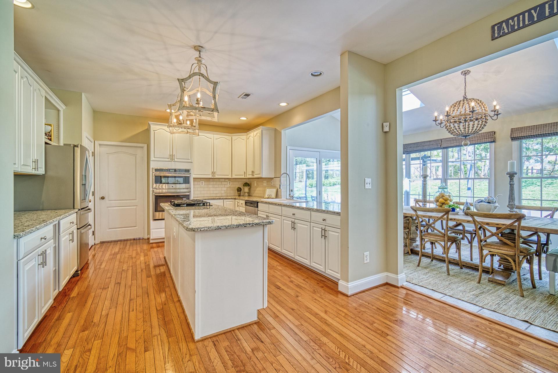 10896 Hunter Gate Way Reston, VA 20194 - Photo 14 of 70 KITCHEN OPENS TO SUNROOM