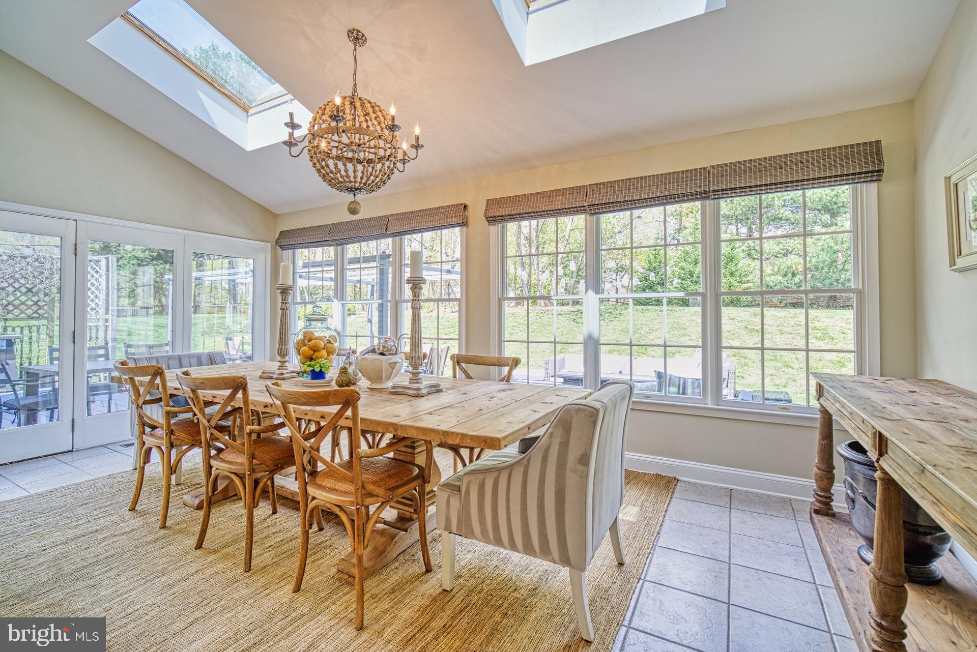10896 Hunter Gate Way Reston, VA 20194 - Photo 19 of 70 SUNROOM ADDITION OPENS TO DECK