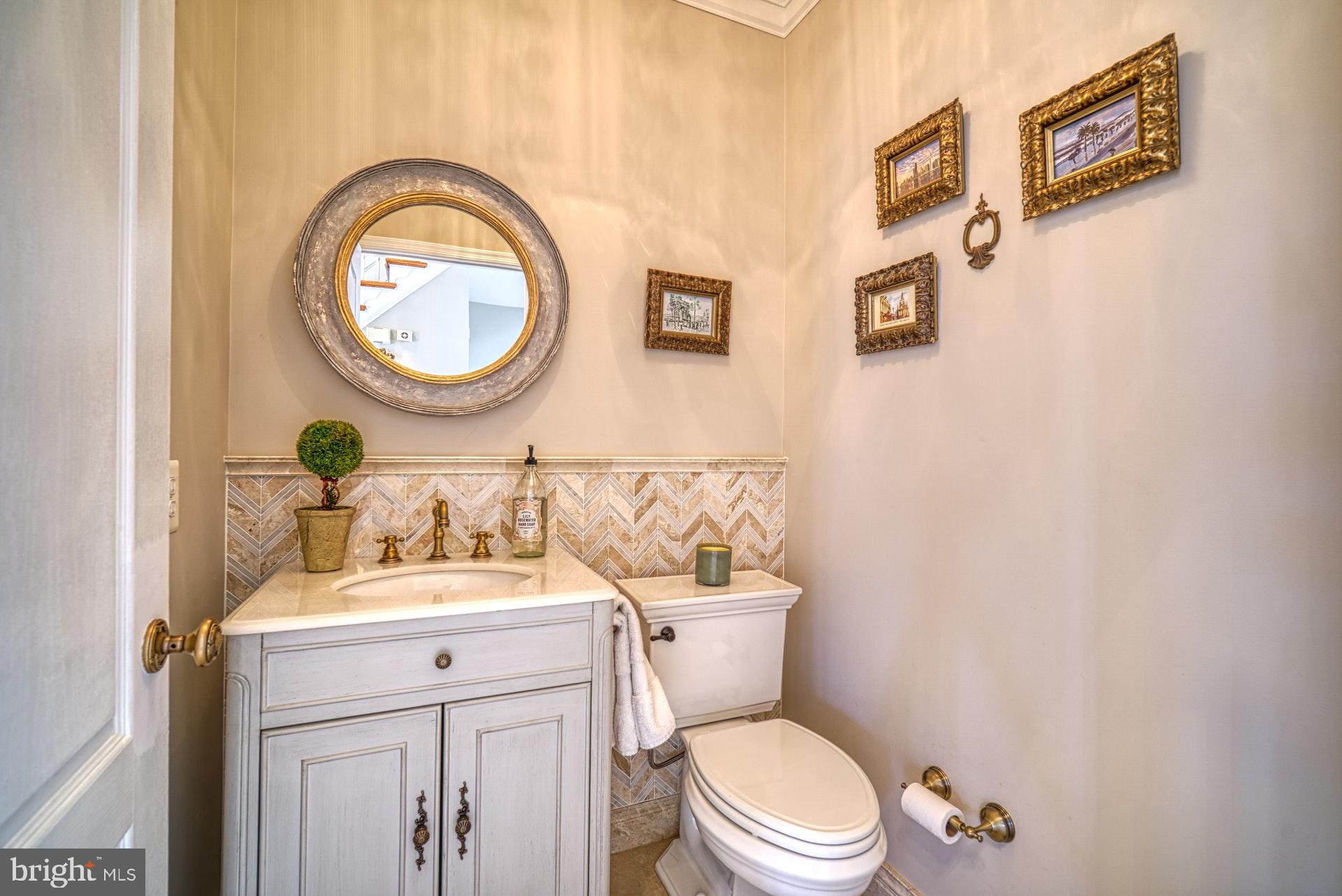 10896 Hunter Gate Way Reston, VA 20194 - Photo 21 of 70 CUSTOM TILE WORK IN POWDER ROOM
