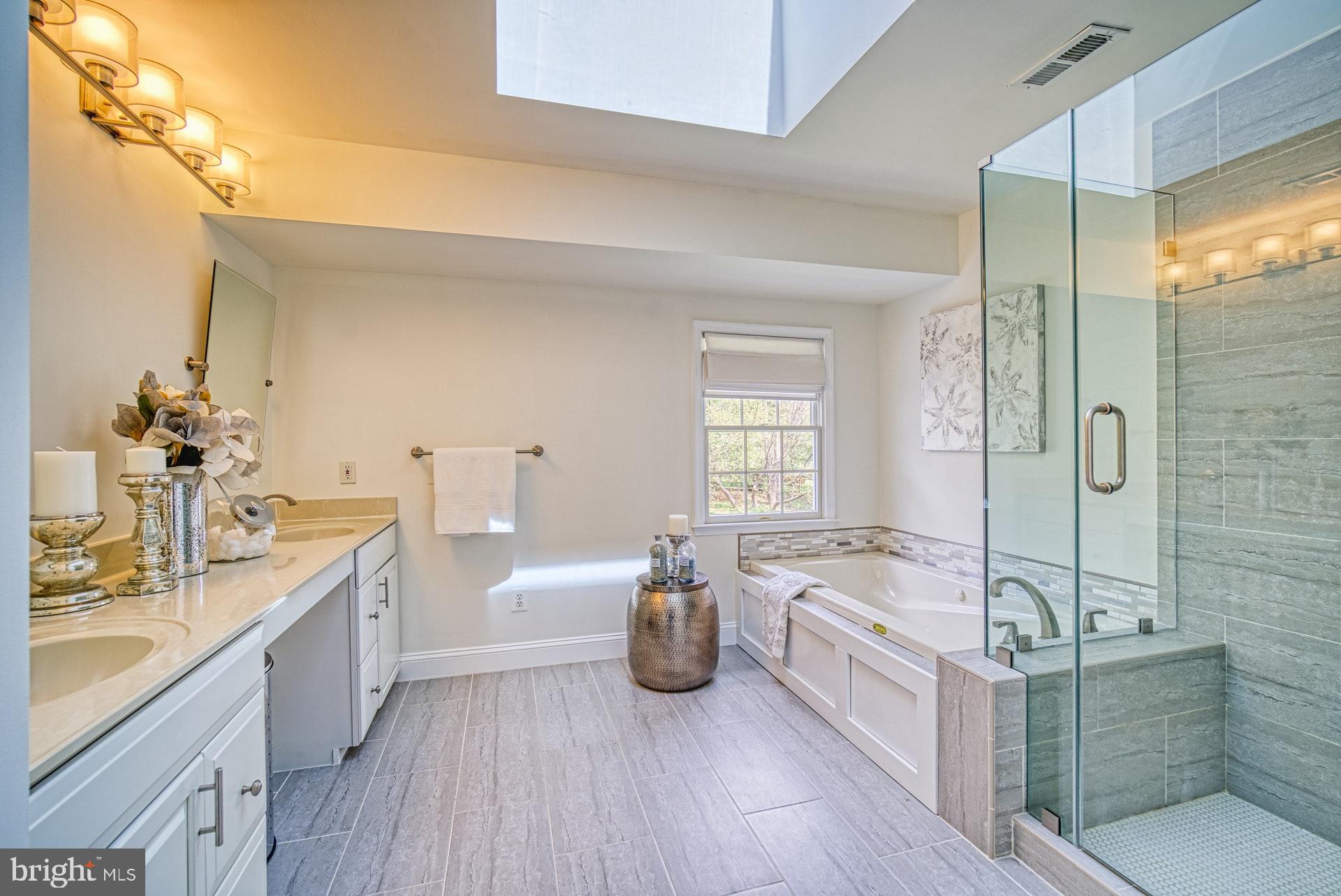 10896 Hunter Gate Way Reston, VA 20194 - Photo 26 of 70 MASTER BATHROOM HAD GLASS SHOWER AND JACUZZI TUB