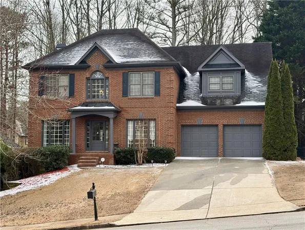 a front view of a house with yard
