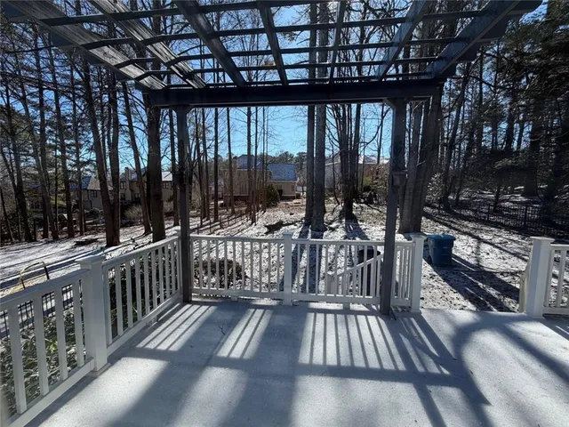 a view of balcony with furniture