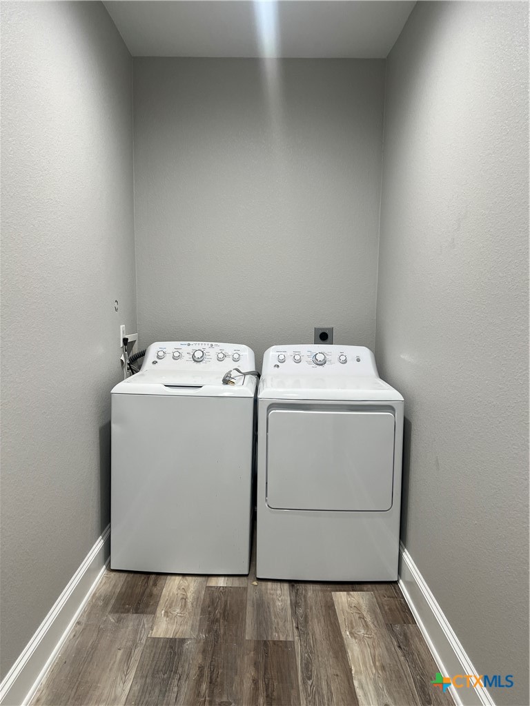 5899 Denmans Loop Belton, TX 76513 - Photo 12 of 35 a utility room with dryer and washer