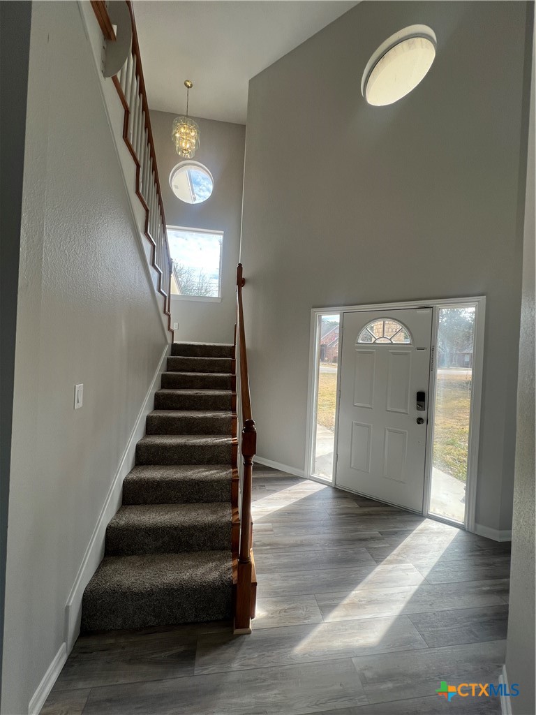 5899 Denmans Loop Belton, TX 76513 - Photo 18 of 35 a view of entryway and hall with wooden floor