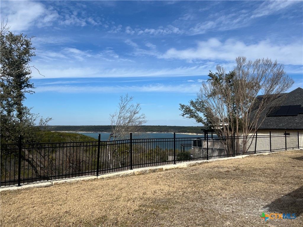 5899 Denmans Loop Belton, TX 76513 - Photo 21 of 35 a view of a backyard with a large tree