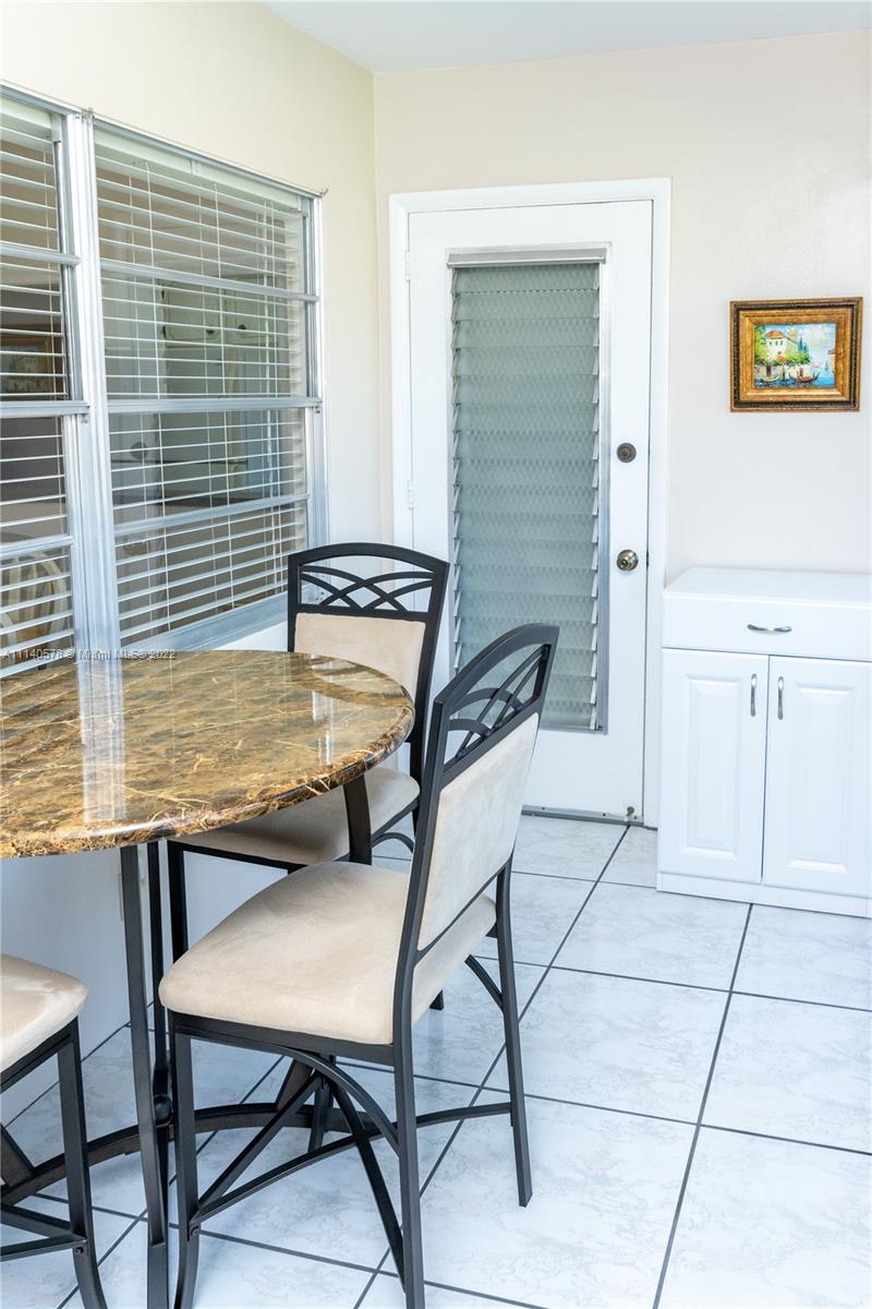 5300 Washington Street, Unit A234 Hollywood, FL 33021 - Photo 15 of 42 a view of a workspace with furniture