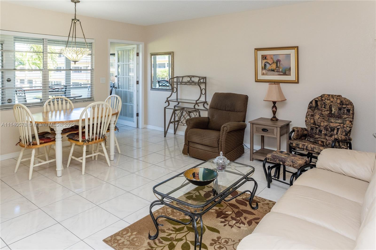5300 Washington Street, Unit A234 Hollywood, FL 33021 - Photo 3 of 42 a view of a livingroom and dining room