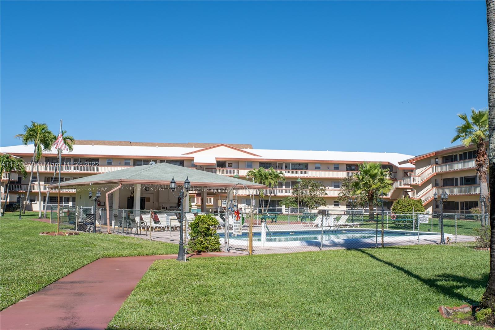 5300 Washington Street, Unit A234 Hollywood, FL 33021 - Photo 26 of 42 a view of a building with a yard