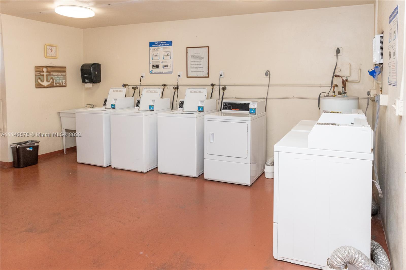 5300 Washington Street, Unit A234 Hollywood, FL 33021 - Photo 29 of 42 a utility room with dryer and washer