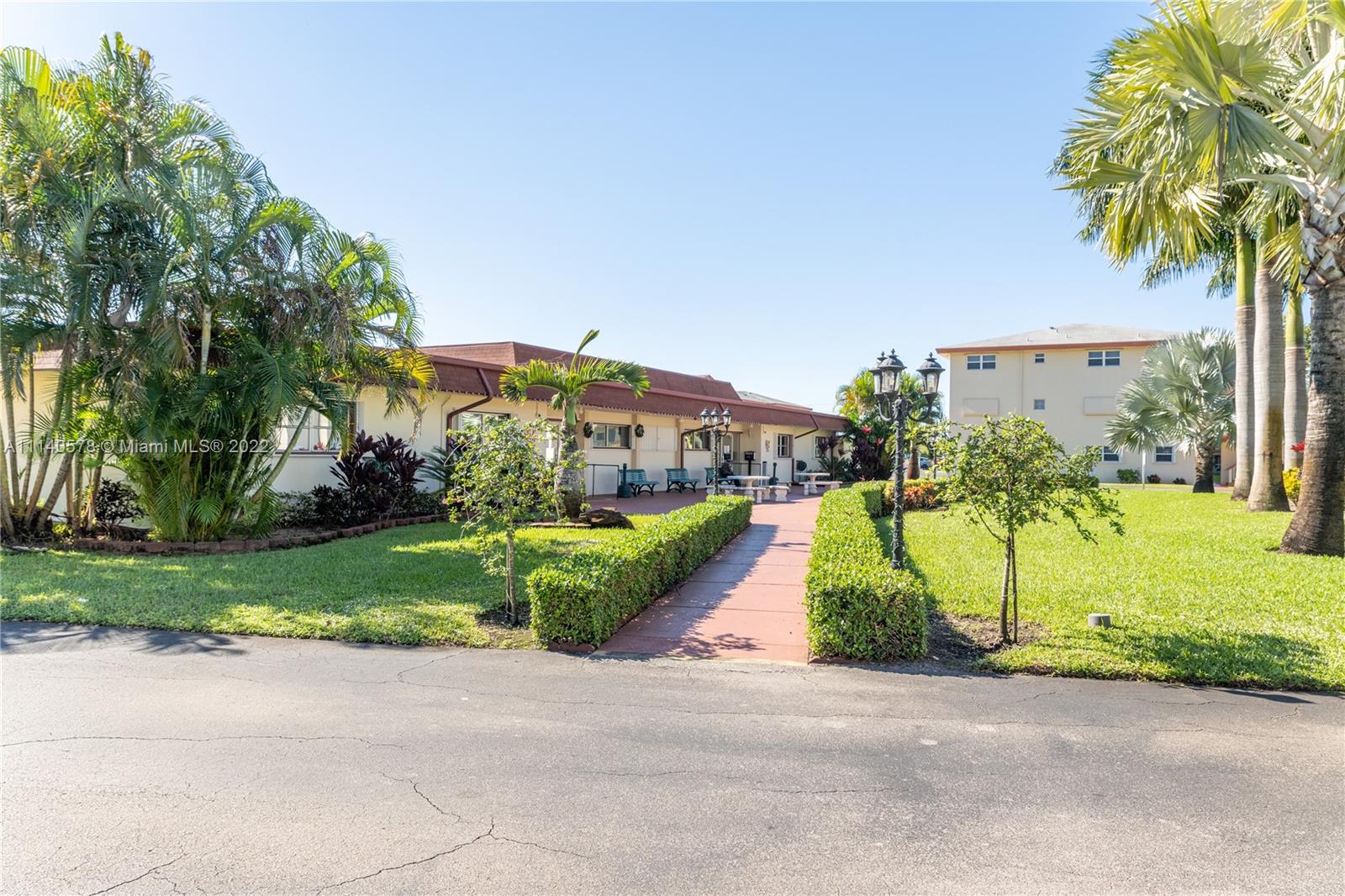 5300 Washington Street, Unit A234 Hollywood, FL 33021 - Photo 31 of 42 a view of a garden with a apartment