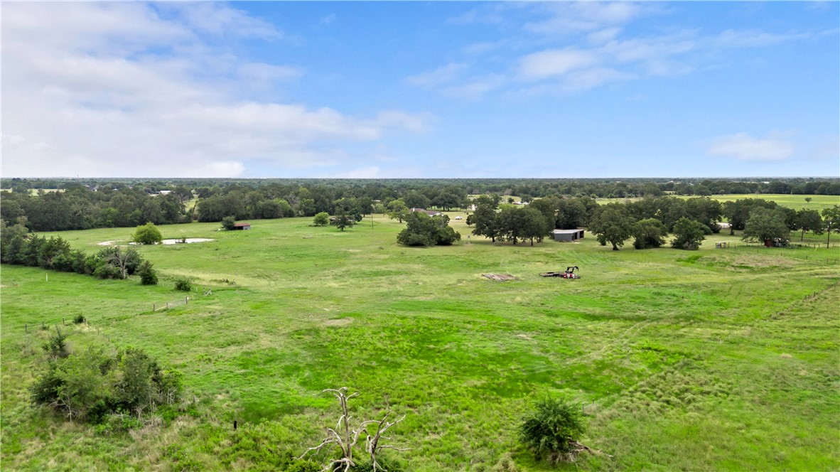8166 Riley Road Bryan, TX 77808 - Photo 4 of 35 a view of grassy field with mountain