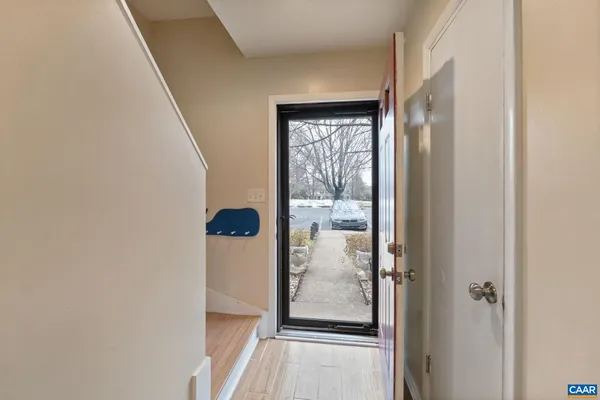 a view of kitchen with furniture and a window