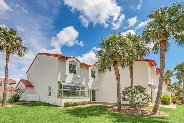 a front view of a house with patio