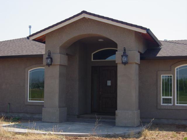 22175 Lone Tree Road Anderson, CA 96007 - Photo 1 of 7 a front view of a house