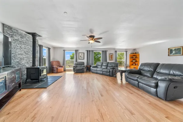 a kitchen with granite countertop a sink and a window