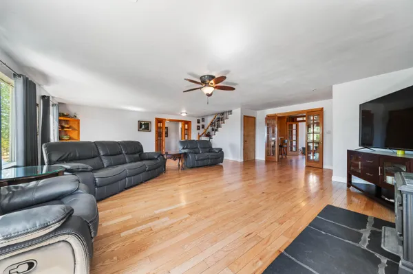 a view of a dining room with furniture and window